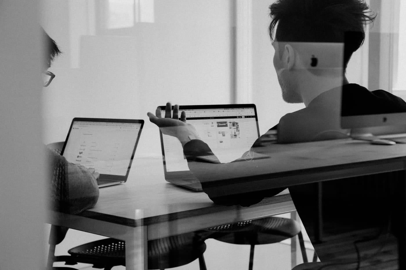 Business team reviewing an automation workflow together